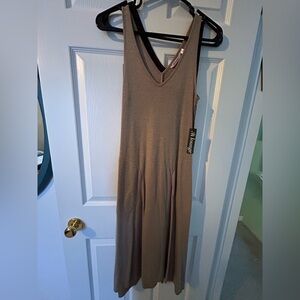 La Vie En Rose night slips (1x grey, 1x purple)
Brand new with tags 
Size XS